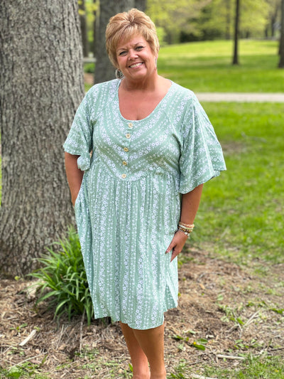 Floral/stripe pocketed curvy dress